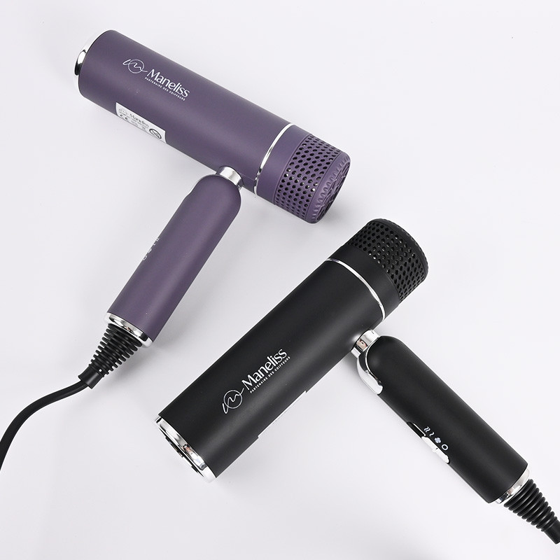 Sèche cheveux pliant "Le voyageur" noir ou violet - Maneliss Sèche cheveux pliant "Le voyageur" noir ou violet - Maneliss